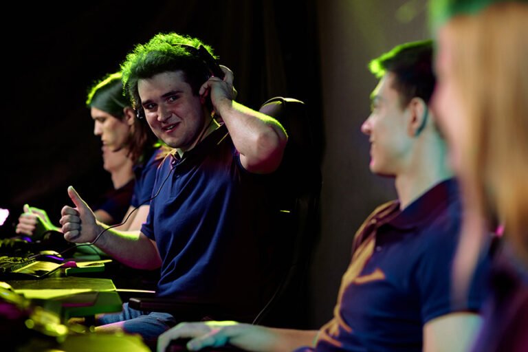 young-successful-e-sport-gamer-showing-thumb-up-an-NRZZCUQ.jpg